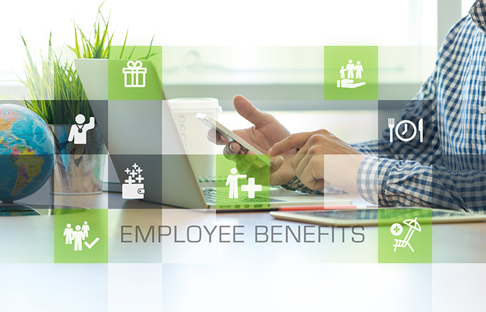 Businessman working in office and Employee Benefits icons concep
